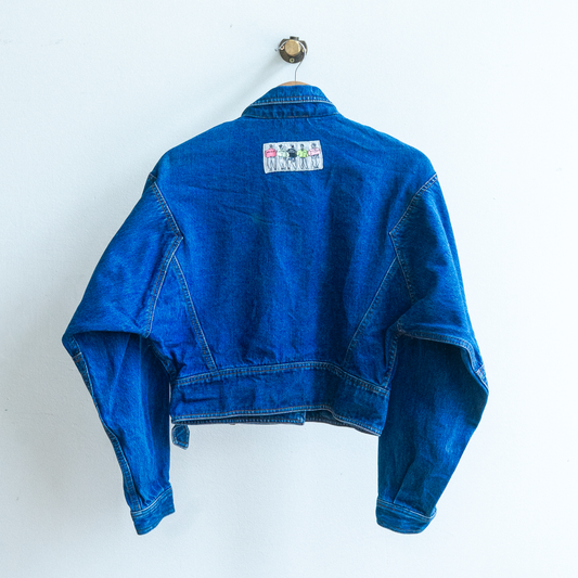 dark blue denim jacket with biker style sleeves with a label on the back below neck of 5 men wearing jeans jackets in pink yellow black yellow and pink 90s style fresh vintage