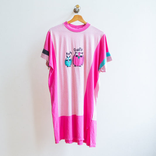 Dress or oversized t-shirt from the 80s with owl design and text nigh owls on a hanger