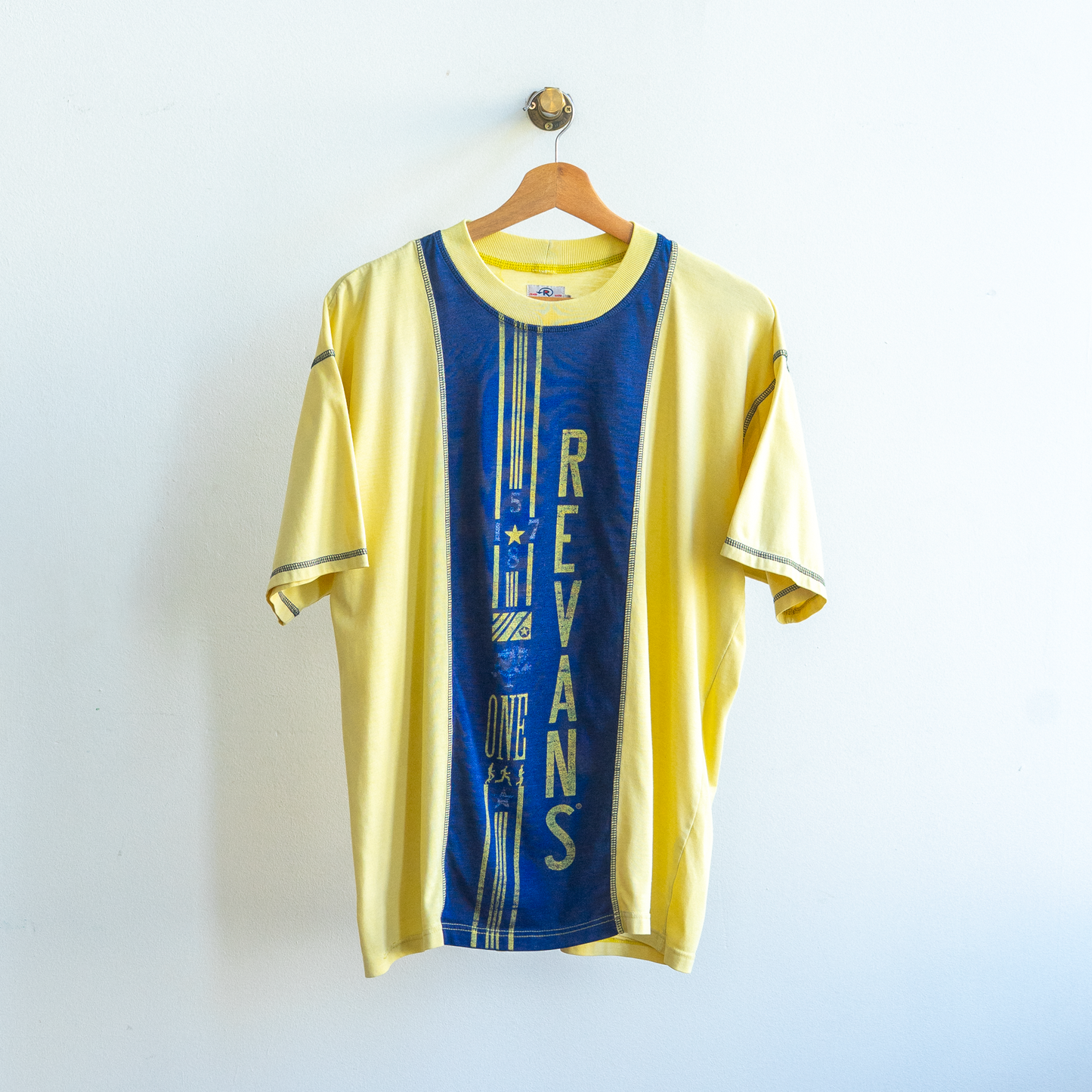 secondhand blue and yellow T-shirt by Revans