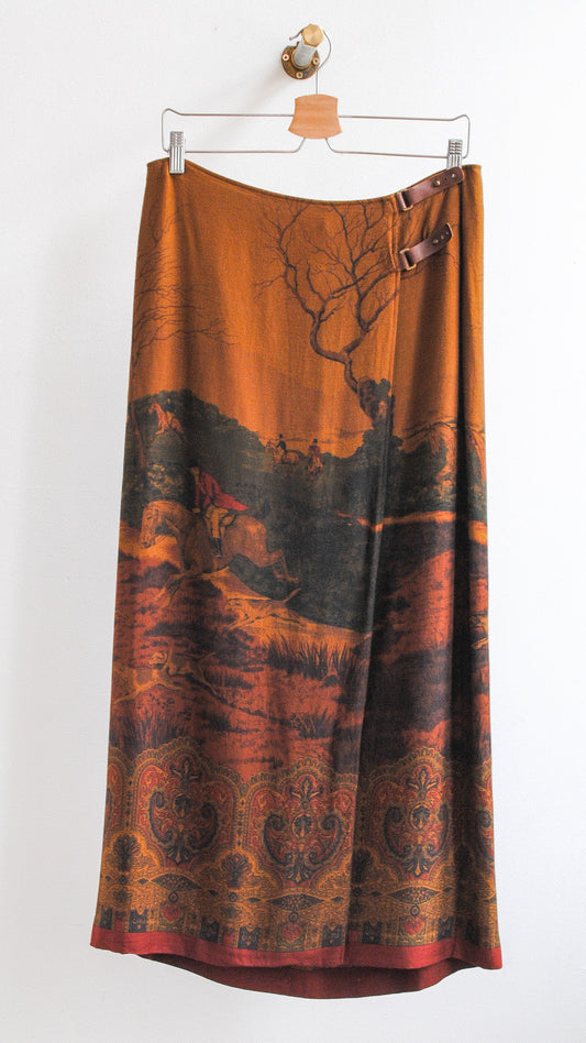 lange bruine vintage yves saint laurent rok met kleine leren bruinen gespen bovenaan en lopende paarden met jockeys in de natuur afgebeeld