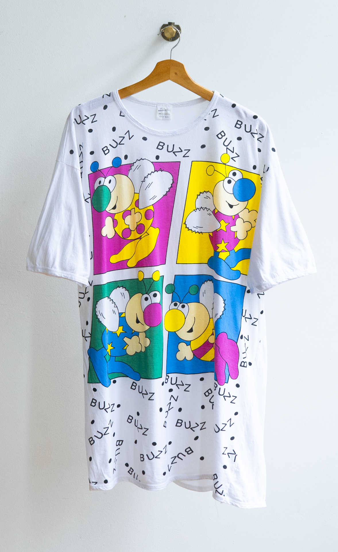 secondhand white sleeping t-shirt with colorful graphics of bees 90s YK