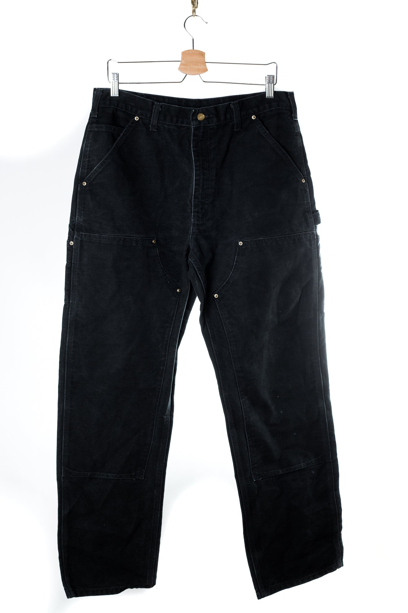 zwarte-carhartt-jeans-met-knoopjes