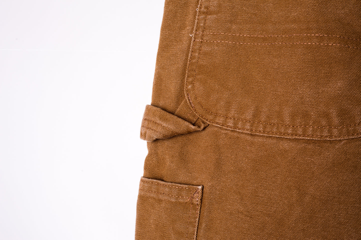 bruin-oranje-carhartt-jeans-detail-stof