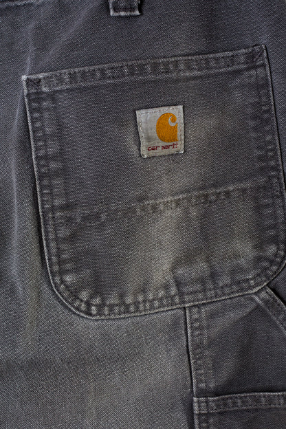 tweedehands-carhartt-jeans-in-grijs-achterzak